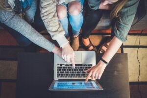 working-together-laptop-branding-building